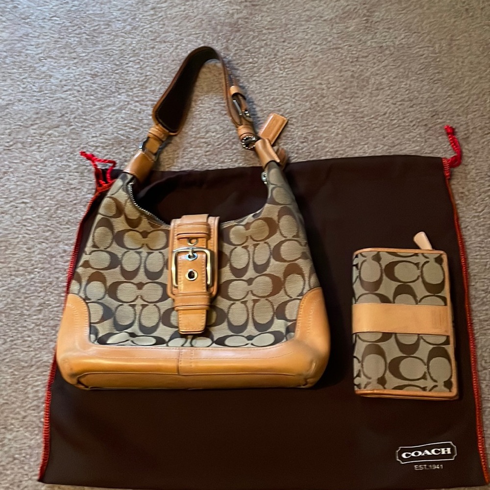 Coach shoulder bag with matching wallet.